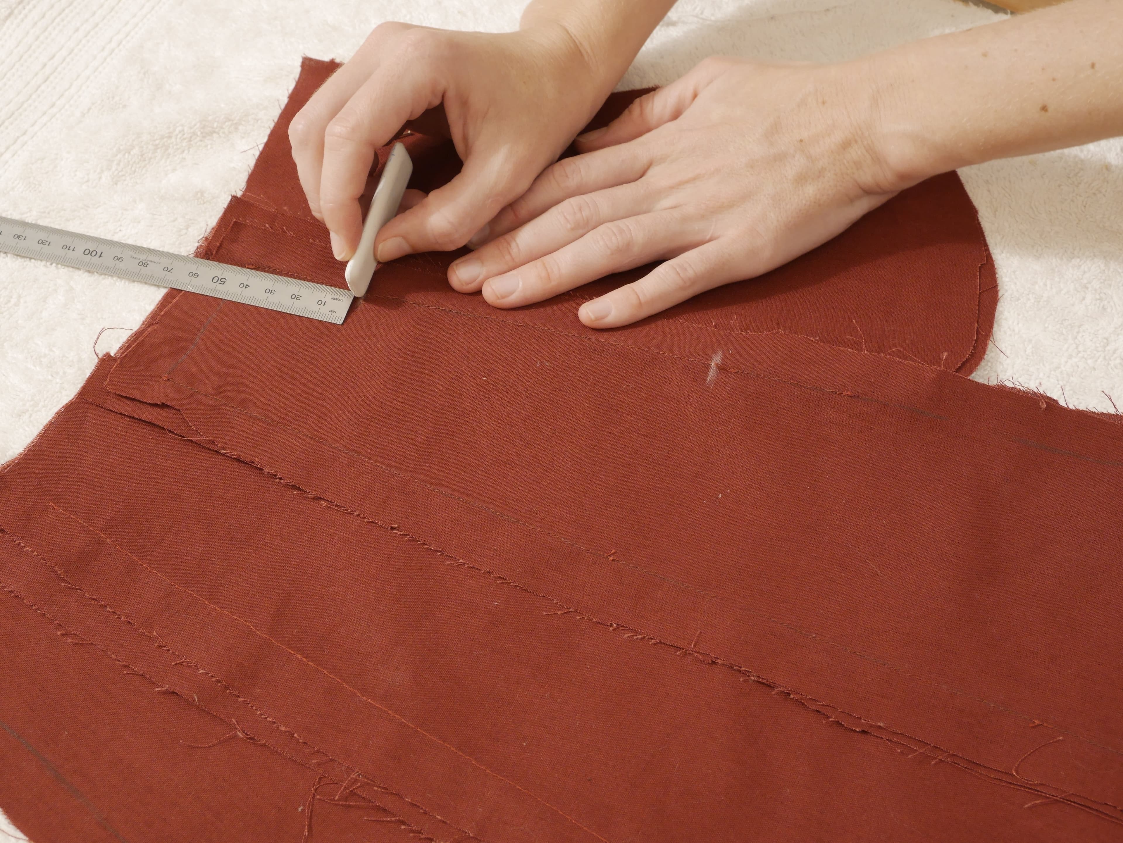 Marking pocket opening with chalk.